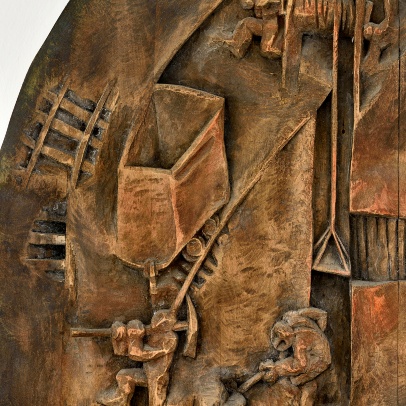 Detail of the HGF emblem displaying working miners, photo by Roman Polášek